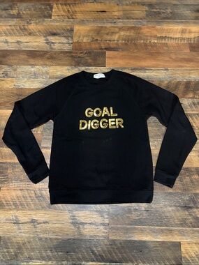Bow & Drape crewneck sweatshirt featuring the phrase "GOAL DIGGER"